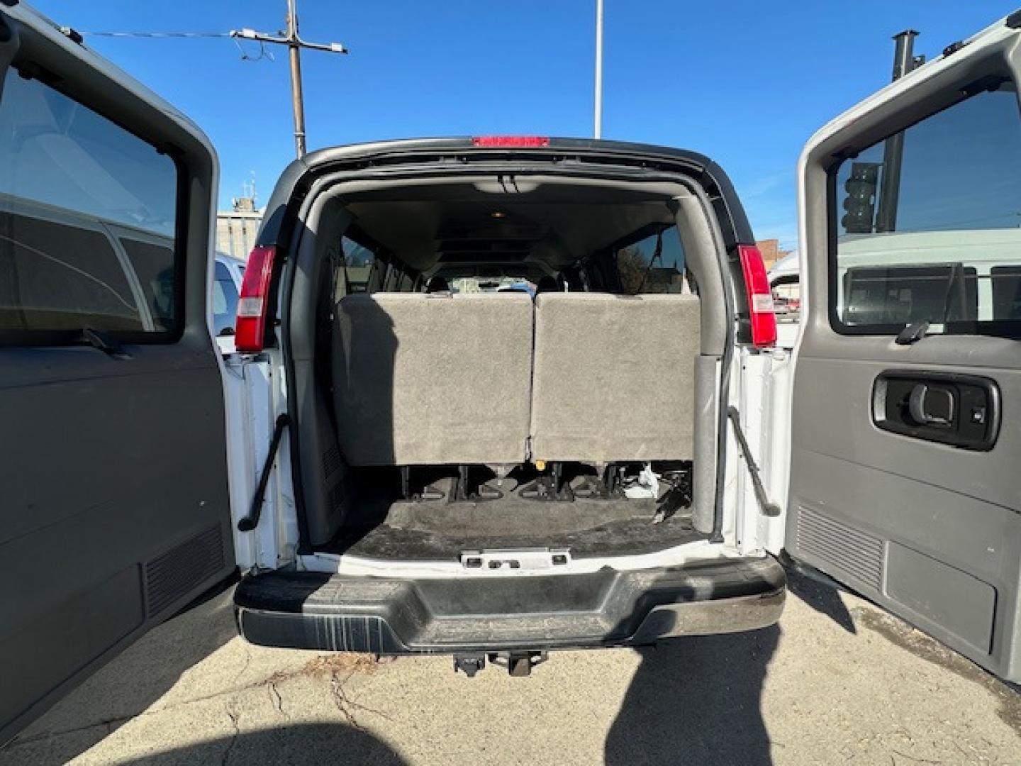 2017 White /GRAY Chevrolet Express LT (1GAZGPFG3H1) with an 6.0 engine, Automatic transmission, located at 3200 1st Avenue North, Billings, MT, 59101, (406) 245-9055, 45.779270, -108.510742 - Super Hard to Find Chevrolet 1 Ton 15 Passenger Van with Low Mileage! Power Windows, Power Door Locks, Tilt Cruise Control, Rear Air Conditioning & Heat, Tow Hitch, Privacy Glass and Only 72,700 Miles. Car Fax Dealer. Auto Brokers of Montana/AA&A Auto Rental/Fox Car Rental Billings - Photo#3